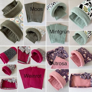Puede incluir: Una colecci&oacute;n de 10 camas para mascotas de diferentes colores de franela. Las camas son de varias formas, incluyendo una cama redonda, una cama rectangular y una cama con un t&uacute;nel. Los colores incluyen verde, rosa, rojo, morado y gris.