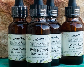May include: Four amber glass bottles with black droppers, labeled "Poke Root Infused Oil." The labels feature a mountain logo and text. Each bottle contains 1 oz. of product.