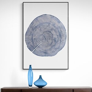 Cedar tree linocut artwork displayed on living room wall, rustic modern home decor inspiration