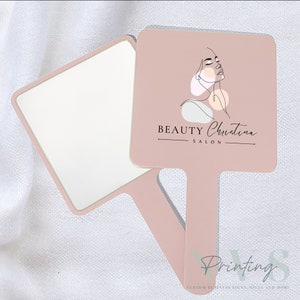 Personalised Handheld Mirror for Make Up Artist in blush pink colour with printed business logo on it, Beauty Christina salon logo with woman silhouette, custom print mirror for salon hairdresser lash tech or brow tech and any beautician, bridal gift