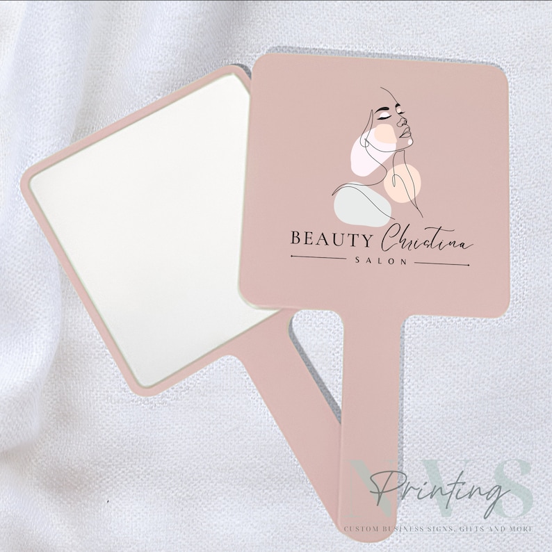 Personalised Handheld Mirror for Make Up Artist in blush pink colour with printed business logo on it, Beauty Christina salon logo with woman silhouette, custom print mirror for salon hairdresser lash tech or brow tech and any beautician, bridal gift