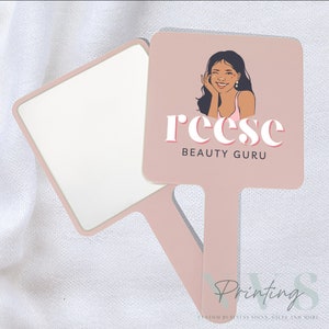 Personalised Handheld Mirror for Make Up Artist in blush pink colour with printed business logo on it, Reese beauty guru logo with woman image holding, custom print mirror for salon hairdresser lash tech or brow tech and any beautician, bridal gift