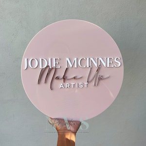 Round business sign in pink nude background with 3D white acrylic and rose gold acrylic