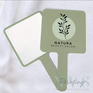 Personalised Handheld Mirror for Make Up Artist in sage green colour with printed business logo on it, Natura beauty salon logo, custom print mirror for salon hairdresser lash tech or brow tech and any beautician, bridal gift