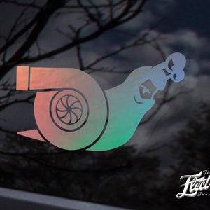May include: A gradient-colored decal featuring a turbocharger design with a stylized snail shape and a roaring face. The Electric Graphix Co. logo is in the bottom right corner.