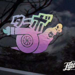 May include: A colorful iridescent vinyl sticker of a snail with a turbocharger shell. The snail is facing right and has a large, detailed turbocharger shell with a swirl design. The sticker has the text "ターボ" in Japanese characters on the shell.