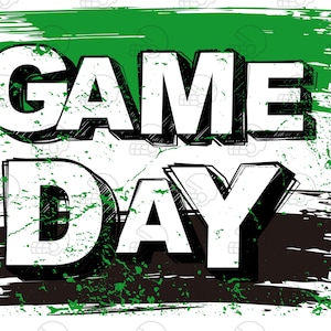 May include: White and black graphic with the words "GAME DAY" in bold, outlined letters. The background has green and black paint strokes and splatters, with a white background. The image has a grunge style.