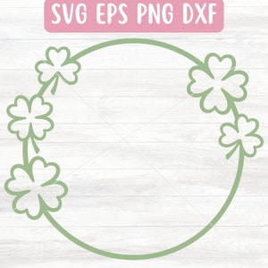 May include: A green outline of a circle with four shamrock leaves around it. The shamrocks are connected by a stem.