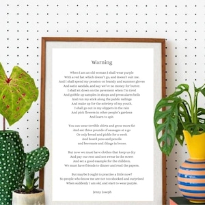 May include: A framed poem titled "Warning" by Jenny Joseph. The poem is about aging and the freedom to be yourself. It includes lines like "When I am an old woman I shall wear purple" and "And learn to spit."