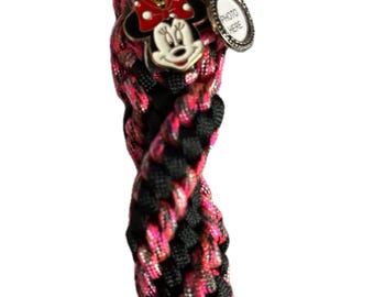 Disney fidget keychain with charm. for design and fidgeting. With small picture frame.