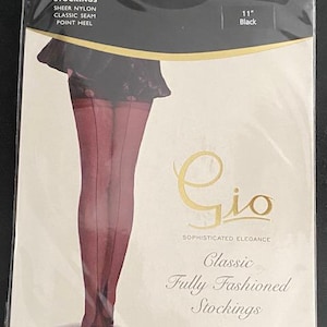 May include: Packaging for 15 denier sheer nylon stockings in black, featuring an 11-inch size label. The package displays an illustration of legs wearing stockings with a classic back seam and point heel, labelled Gio Classic Fully Fashioned Stockings.