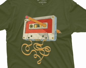 May include: A green t-shirt with a vintage cassette tape graphic. The tape is partially unwound and a pencil is sticking out of the cassette. The text "Silver Lake T-Shirts" is printed on the tag.