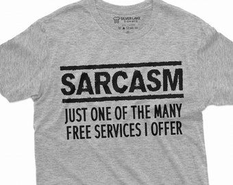 May include: Gray t-shirt with black text that reads "SARCASM JUST ONE OF THE MANY FREE SERVICES I OFFER".