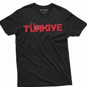 May include: Black t-shirt with a red graphic of the word "TÜRKIYE" with a Turkish flag design in the "U".