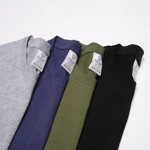May include: Four t-shirts in different colors: gray, blue, green, and black. Each shirt has a white tag with the text "Silver Lake Apparel" and care instructions.