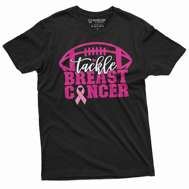 May include: Black t-shirt with a pink football graphic and the text "Tackle Breast Cancer" with a pink ribbon.