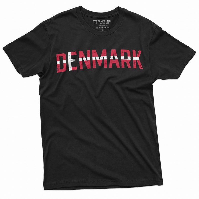 May include: Black t-shirt with the word "DENMARK" printed in white letters with a red and white Danish flag design.