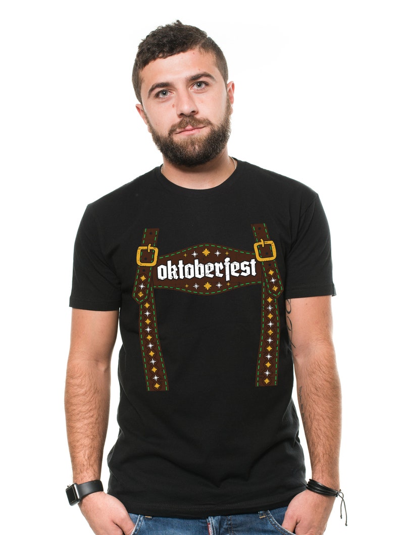 May include: Black t-shirt featuring a brown and white graphic of braces and the word "Oktoberfest" in white.