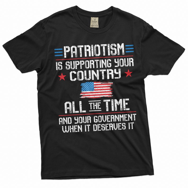 May include: Black t-shirt with a distressed graphic design that reads "PATRIOTISM is supporting your COUNTRY ALL THE TIME and your government when it deserves it". The graphic also includes a red, white, and blue American flag.