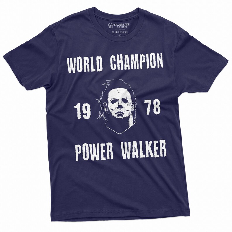 May include: A navy blue t-shirt with a white graphic of a hockey mask, the text "WORLD CHAMPION", "19 78", and "POWER WALKER".