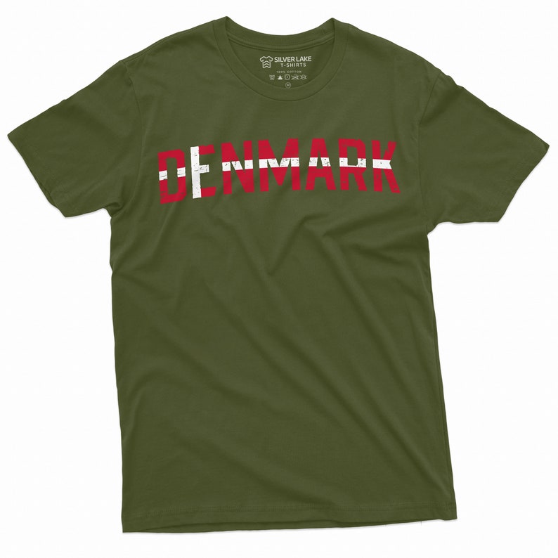 May include: A green t-shirt with the word "DENMARK" printed in red and white letters, resembling the Danish flag.