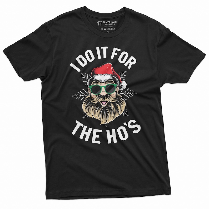 May include: Black t-shirt with a white graphic of Santa Claus wearing sunglasses and a beard. The text "I do it for the ho's" is printed below the image.