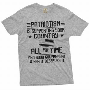 May include: Gray t-shirt with a distressed graphic print that reads "=PATRIOTISM= IS SUPPORTING YOUR ★ COUNTRY ★ ALL THE TIME AND YOUR GOVERNMENT WHEN IT DESERVES IT".