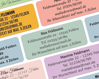 May include: A collection of colourful address labels featuring the name "Feldmann" and various variations, such as "Max Feldmann", "Familie Feldmann", and "Maxime Feldmann". Each label includes an address, phone number, and email address. The labels are printed on white paper with a black font.