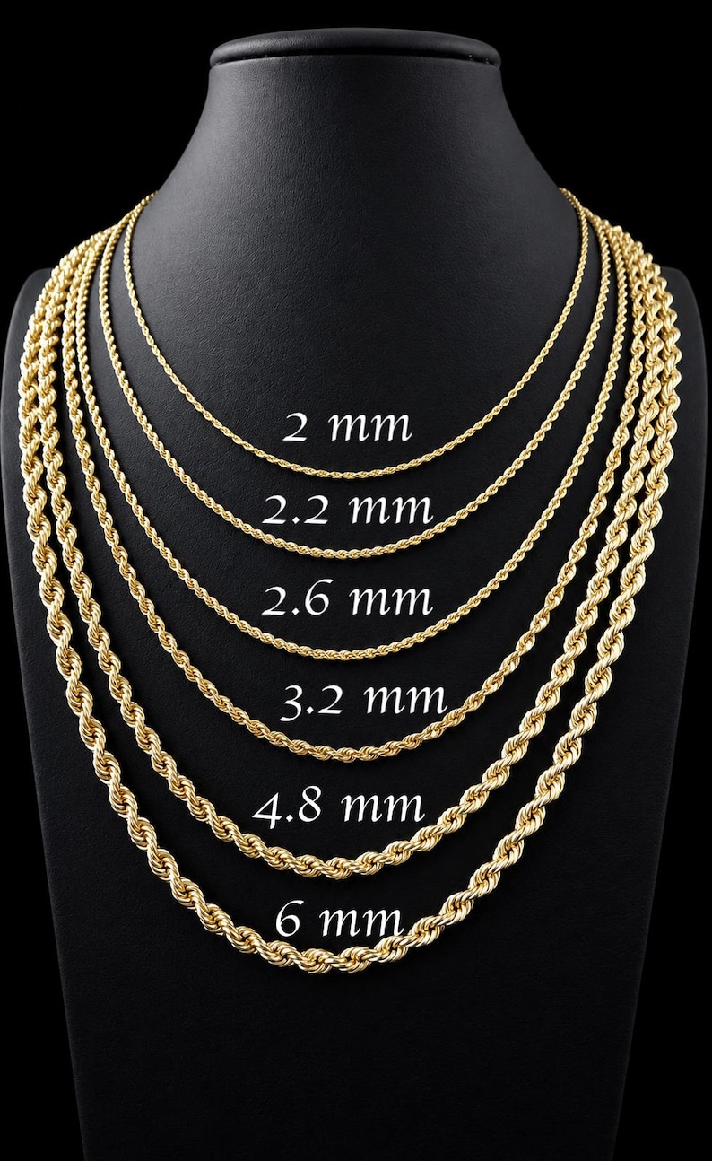 May include: A display of gold-colored rope chains of varying thicknesses, from 2 mm to 6 mm, against a black background. Each chain is labeled with its size in millimeters, showcasing the different chain styles available.