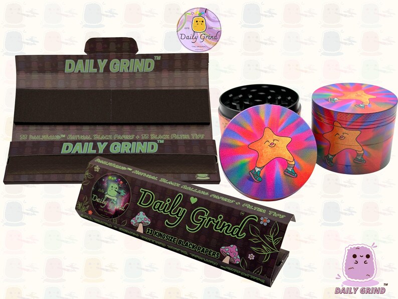 A black and green box with the text 'Daily Grind' and Kingsize Black Papers' on it. The box is open and there are black papers inside. There is a tobacco grinder with a very happy and confident star character in the middle with rays of light behind him next to the box and the 'Daily Grind' logo is in the corner of the image