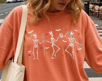 Comfort Colors® Halloween Nurse Skeleton Shirt, Spooky RN, Funny Nurse Life Tee, Dancing Skeleton Nurse, Fall Nursing Gift, Healthcare Tee