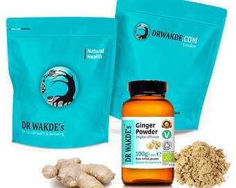 以下が含まれることがあります： 「DR WAKDE'S」と「Natural Health」の文字が書かれた青い袋が2つ。白いラベルに「Ginger Powder」と「DR WAKDE'S」と書かれた茶色のガラス瓶。瓶の隣には、薄い茶色の粉の山。画像の左下には、新鮮な生姜の根がある。