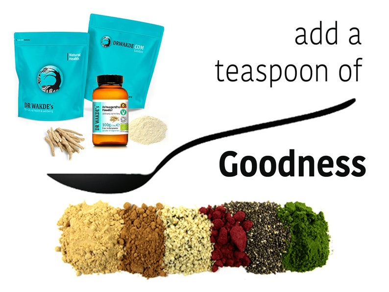 May include: A spoonful of various powders, including turmeric, cacao, hemp seeds, red raspberry, chia seeds, and matcha powder. The text "add a teaspoon of Goodness" is written above the spoon.