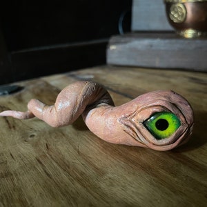 Familiar eyeball oddity, gothic, curiosity