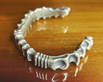 Biomechanical silver bracelet