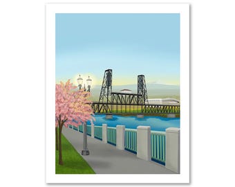 May include: A black bridge spans a river with a walkway on one side. A pink cherry blossom tree is in the foreground. The bridge is in the background with a mountain range in the distance.