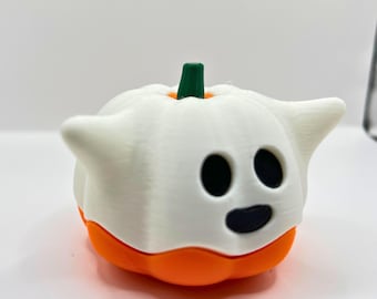 May include: A 3D-printed Halloween decoration of a ghost-pumpkin hybrid. The ghost is white with black eyes and a black mouth. The pumpkin base is orange, and the stem is green. A fun, festive item for Halloween.