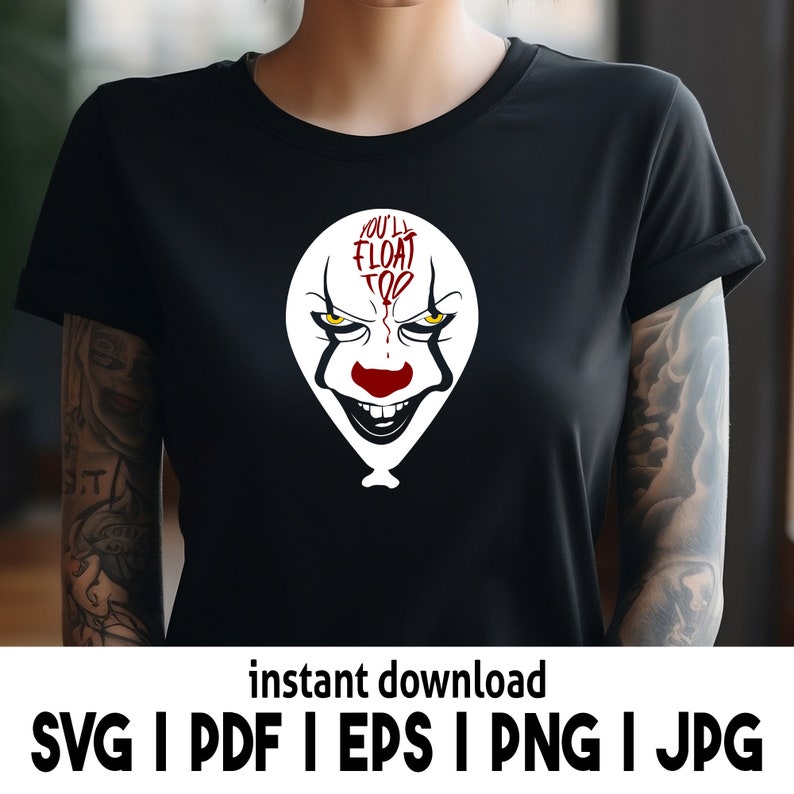 Puede incluir: Camiseta negra con un gr&aacute;fico blanco de una cara de payaso en forma de globo. El payaso tiene el pelo rojo, una nariz roja y una amplia sonrisa. El texto "You'll Float Too" est&aacute; escrito en el globo.