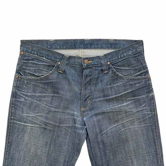 Buy Wrangler Men Blue Rockville Fit Low Rise Clean Look Stretchable Jeans -  Jeans for Men 7725606 | Myntra
