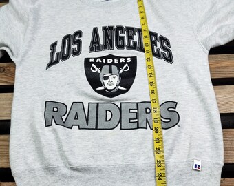 Vintage 90s Distressed Oakland Raiders Football by Russell
