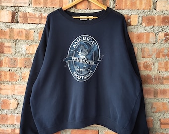 Vintage des années 90 Distressed Ducks American Sportsman Fieldmaster sweat canards ras du cou canards pull imprimé logo couleur bleu homme coupe L