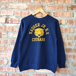 Vintage 80s Hauser JR. H.S. Cougars by Champion Sweatshirt Cougars Crewneck Cougars Pullover Embossed Logo Blue Color Women’s Fit S