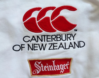 Vintage 90er Jahre DISTRESSED Canterbury Neuseeland Steinlager Sweatshirt Canterbury Half Zipper Embroidery Logo Blau Farbe Herren L