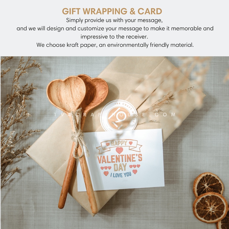 May include: A brown paper gift box with two wooden heart-shaped spoons tied together with twine. The box has a card on top that says "Happy Valentine's Day I Love You" with a red heart.