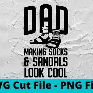 May include: Black and white graphic design with the text "DAD MAKING SOCKS & SANDALS LOOK COOL" and a pair of feet wearing socks and sandals.