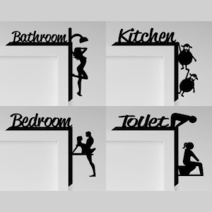 May include: Four black metal signs with humorous illustrations and room names: Bathroom, Kitchen, Bedroom, and Toilet.