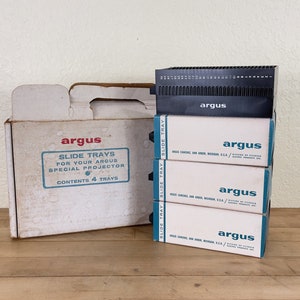 May include: A set of three ceramic mugs with a speckled, matte finish. The mugs are in shades of cream, light gray, and dark gray. Each mug has a simple, minimalist design, perfect for coffee or tea.