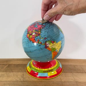 As Is - J Chein Metal Globe Bank With Zodiacs Around the base, Steel Globe Shaped Coin Bank