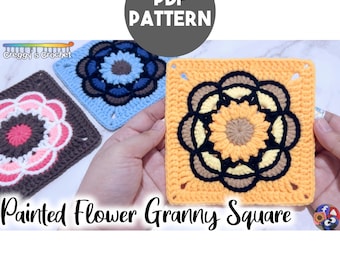 Può includere: Un modello PDF per un quadrato granny a fiore dipinto con tre quadrati all'uncinetto in arancione, blu e marrone con motivi floreali. Il testo recita PDF PATTERN, Creggy's Crochet e Painted Flower Granny Square.