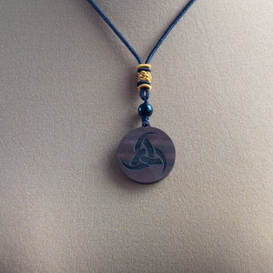 Necklace with Odin&#39;s horns made of walnut wood decorated with black pearl